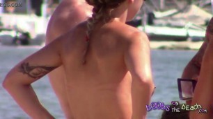 Guys gather around and look at our big fake tits on the topless beach