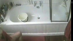 Spying my horny mom masturbating in toilet